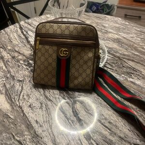 Designer messenger bag lightly used a few times. Great condition